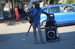 Pardon Ndlovu posing for a camera in the streets. Pic By Chris Tabvura
