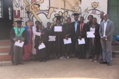 The graduates posing with guest of honour.