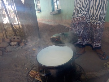 A pot of porridge on the fire stove